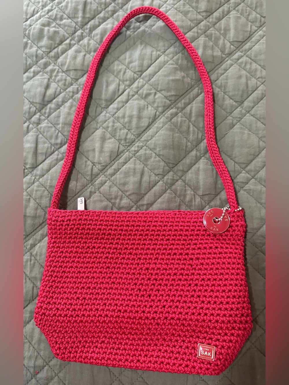 The Sak Handwoven Red Shoulder Bag with Logo Charm